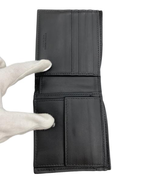 BOTTEGA VENETA（ボッテガベネタ）BOTTEGA VENETA (ボッテガベネタ) 2つ折り財布 ブラックの古着・服飾アイテム