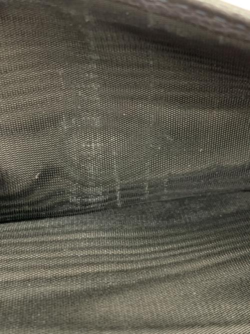 TOD'S（トッズ）TOD'S (トッズ) ラウンドファスナー財布 ブラックの古着・服飾アイテム