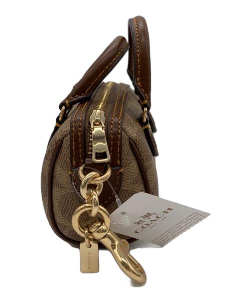 COACH（コーチ）COACH (コーチ) チャーム ブラウン×ベージュ 未使用品の古着・服飾アイテム