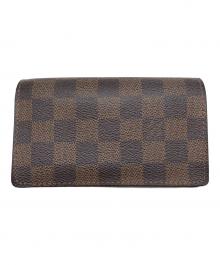 LOUIS VUITTON（ルイ ヴィトン）の古着「2つ折り財布」｜ブラウン