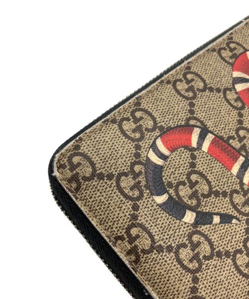 GUCCI（グッチ）GUCCI (グッチ) キングスネークプリントラウンドファスナー財布 ブラウンの古着・服飾アイテム