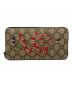 GUCCI（グッチ）の古着「キングスネークプリントラウンドファスナー財布」｜ブラウン