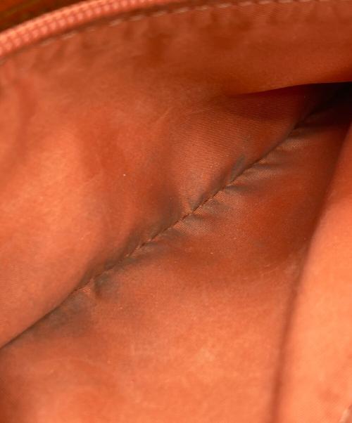 COACH（コーチ）COACH (コーチ) ラウンドファスナー長財布 オレンジの古着・服飾アイテム