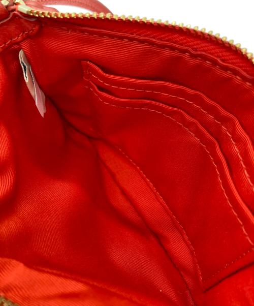 COACH（コーチ）COACH (コーチ) ストラップミニポーチ レッドの古着・服飾アイテム