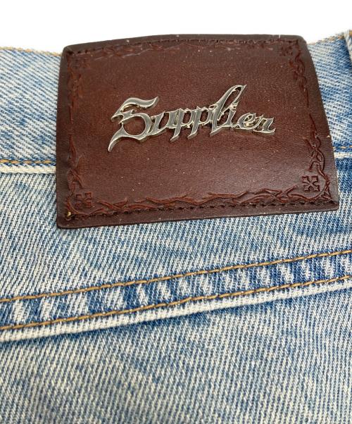 SUPPLIER（サプライヤー）SUPPLIER (サプライヤー) Tribal Leather Patch Baggy Denim インディゴ サイズ:Ｌの古着・服飾アイテム