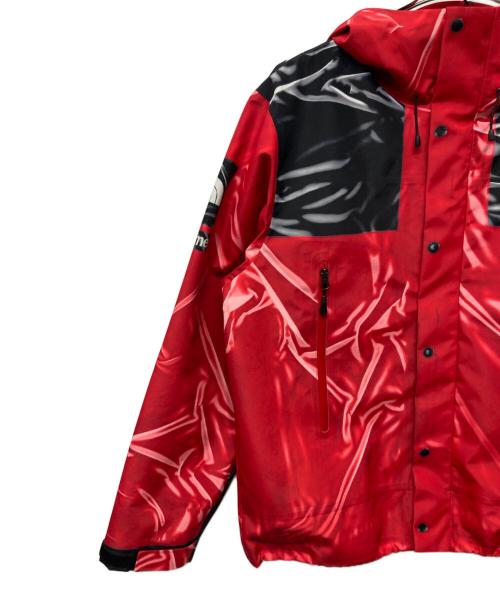 THE NORTH FACE × Supreme（ザノースフェイス×シュプリーム）THE NORTH FACE × Supreme (ザノースフェイス×シュプリーム) Trompe Loeil Printed Taped Seam Shell Jacket レッド サイズ:Mの古着・服飾アイテム