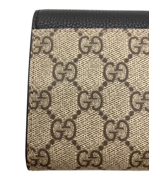 GUCCI（グッチ）GUCCI (グッチ) 2つ折り財布 ブラック×ベージュの古着・服飾アイテム