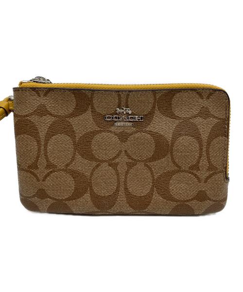 COACH（コーチ）COACH (コーチ) ポーチ ベージュ×イエローの古着・服飾アイテム
