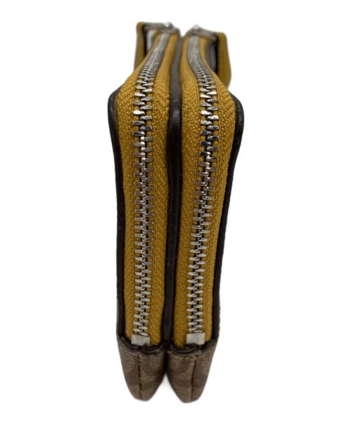 COACH（コーチ）COACH (コーチ) ポーチ ベージュ×イエローの古着・服飾アイテム