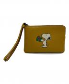COACH×PEANUTSコーチ×ピーナッツ）の古着「ポーチ」｜イエロー