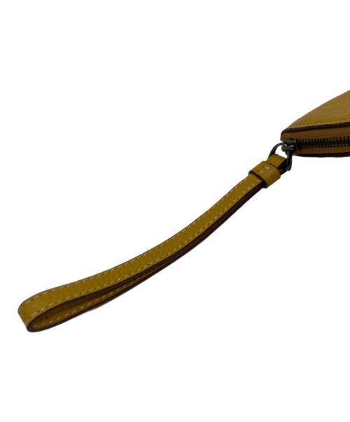 COACH（コーチ）COACH (コーチ) PEANUTS (ピーナッツ) ポーチ イエローの古着・服飾アイテム