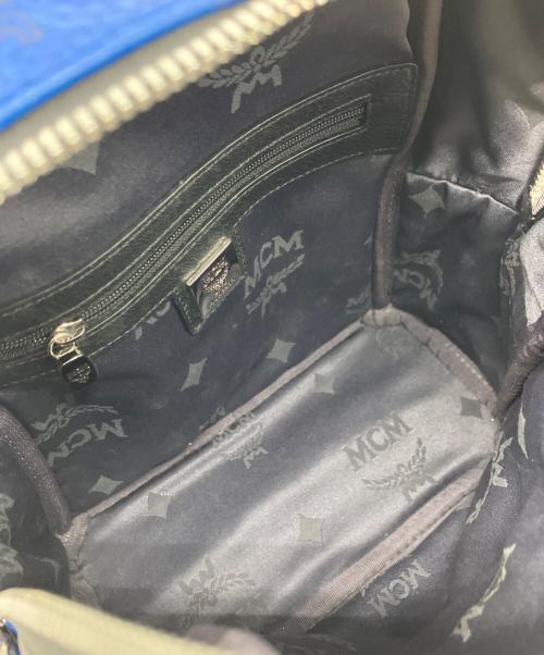 MCM（エムシーエム）MCM (エムシーエム) スタッズリュック ブルーの古着・服飾アイテム