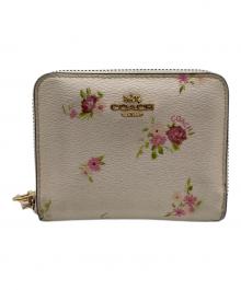 COACH（コーチ）の古着「ラウンドファスナー財布」｜ベージュ