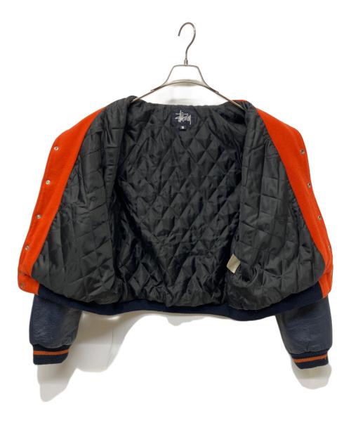 stussy（ステューシー）stussy (ステューシー) スタジャン オレンジ×ネイビー サイズ:Sの古着・服飾アイテム