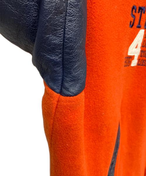 stussy（ステューシー）stussy (ステューシー) スタジャン オレンジ×ネイビー サイズ:Sの古着・服飾アイテム