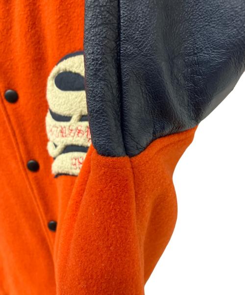 stussy（ステューシー）stussy (ステューシー) スタジャン オレンジ×ネイビー サイズ:Sの古着・服飾アイテム