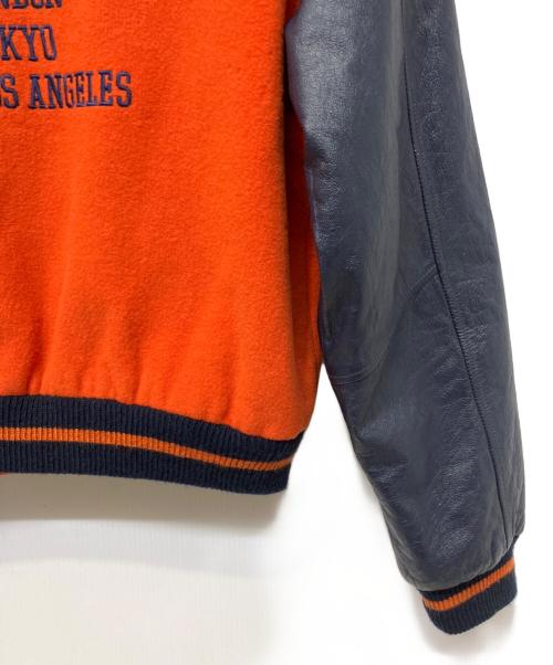 stussy（ステューシー）stussy (ステューシー) スタジャン オレンジ×ネイビー サイズ:Sの古着・服飾アイテム