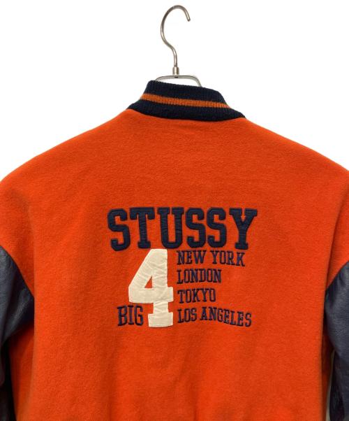 stussy（ステューシー）stussy (ステューシー) スタジャン オレンジ×ネイビー サイズ:Sの古着・服飾アイテム