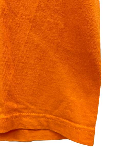 INDEPENDENT（インディペンデント）INDEPENDENT (インディペンデント) 半袖カットソー オレンジ サイズ:Mの古着・服飾アイテム
