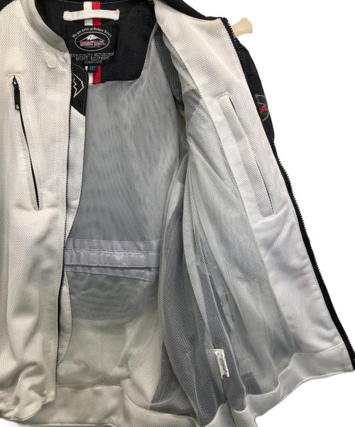 KUSHITANI（クシタニ）KUSHITANI (クシタニ) メッシュライダースジャケット ホワイト×ブラック サイズ:XLの古着・服飾アイテム