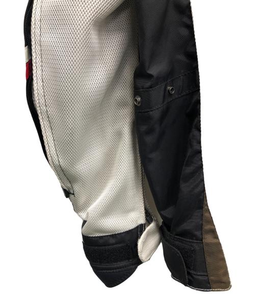 KUSHITANI（クシタニ）KUSHITANI (クシタニ) メッシュライダースジャケット ホワイト×ブラック サイズ:XLの古着・服飾アイテム