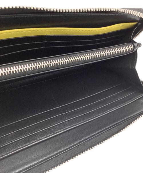 Dior（ディオール）Dior (ディオール) 長財布 イエロー×ブラックの古着・服飾アイテム