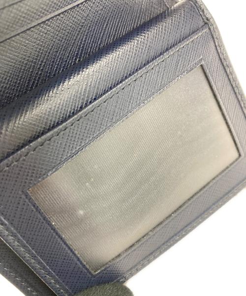 Salvatore Ferragamo（サルヴァトーレ フェラガモ）Salvatore Ferragamo (サルヴァトーレ フェラガモ) コンパクトウォレット ネイビーの古着・服飾アイテム