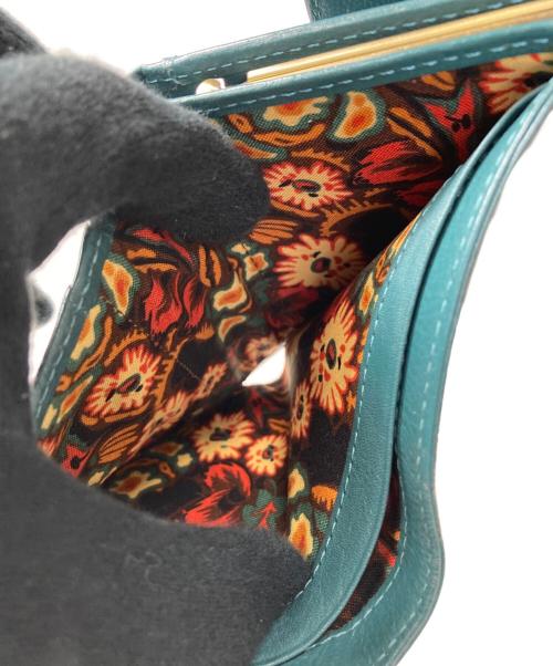 ANNA SUI（アナスイ）ANNA SUI (アナスイ) 2つ折りがま口財布 グリーン×ゴールドの古着・服飾アイテム