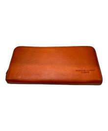 KATHARINE HAMNETT（キャサリンハムネット）の古着「長財布」｜オレンジ