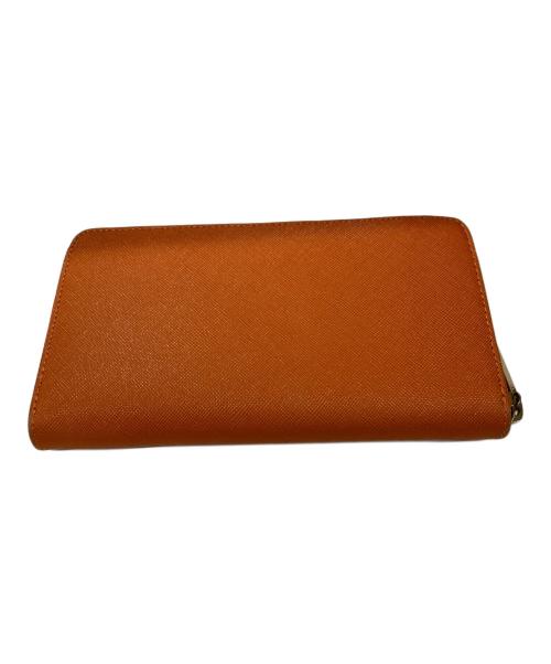 TORY BURCH（トリーバーチ）TORY BURCH (トリーバーチ) ラウンドファスナー財布 オレンジの古着・服飾アイテム