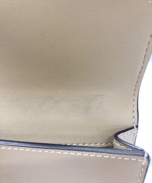 COACH（コーチ）COACH (コーチ) 2つ折り財布 ベージュの古着・服飾アイテム