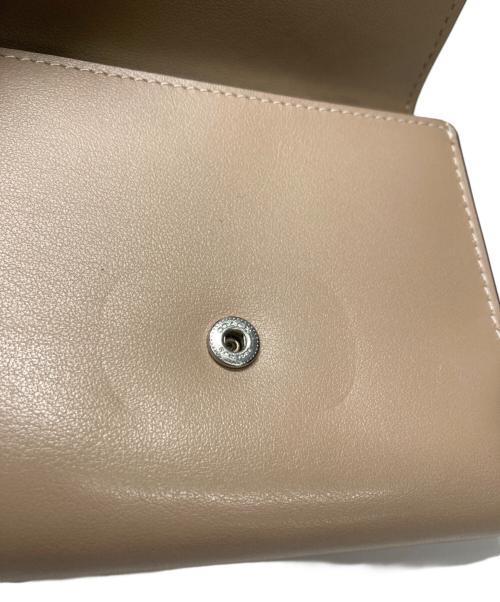 COACH（コーチ）COACH (コーチ) 2つ折り財布 ベージュの古着・服飾アイテム