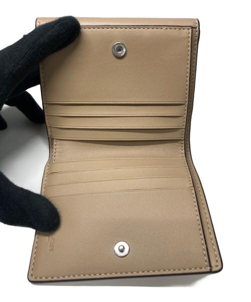 COACH（コーチ）COACH (コーチ) 2つ折り財布 ベージュの古着・服飾アイテム