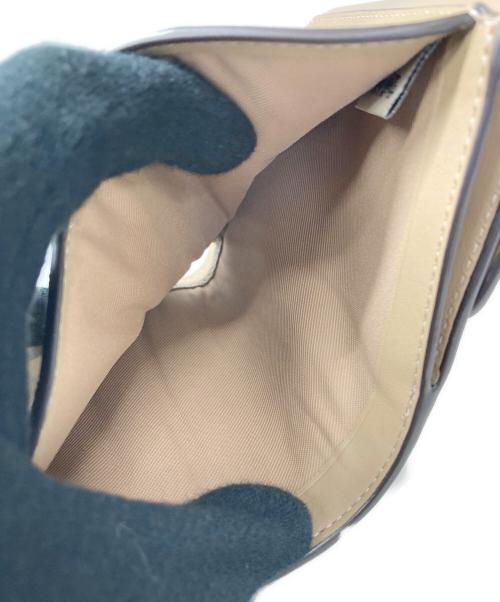 COACH（コーチ）COACH (コーチ) 2つ折り財布 ベージュの古着・服飾アイテム