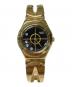 SWATCH（スウォッチ）の古着「腕時計」｜ブラック×ゴールド