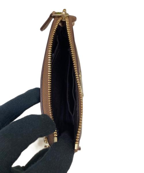 COACH（コーチ）COACH (コーチ) 携帯ポーチ ベージュの古着・服飾アイテム