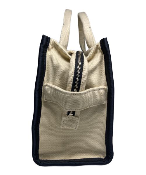 MARC JACOBS（マークジェイコブズ）MARC JACOBS (マークジェイコブス) キャンバストートバッグ ベージュ×ブラックの古着・服飾アイテム