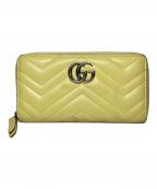 GUCCIグッチ）の古着「ラウンドジップウォレット」｜イエロー
