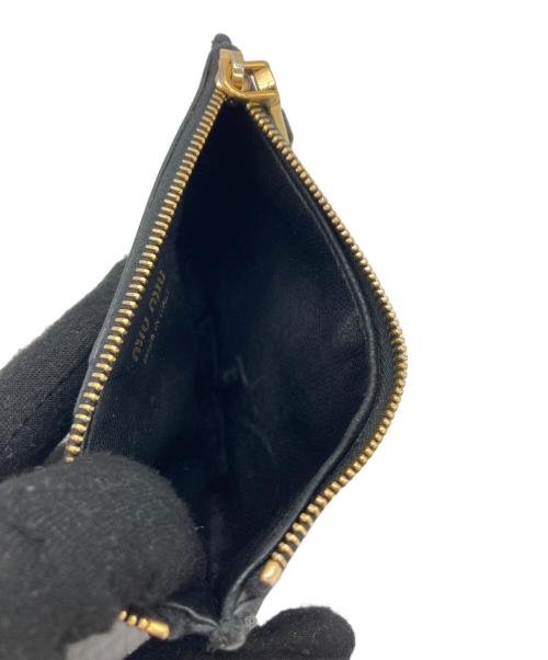 MIU MIU（ミュウミュウ）MIU MIU (ミュウミュウ) フラグメントケース ブラックの古着・服飾アイテム