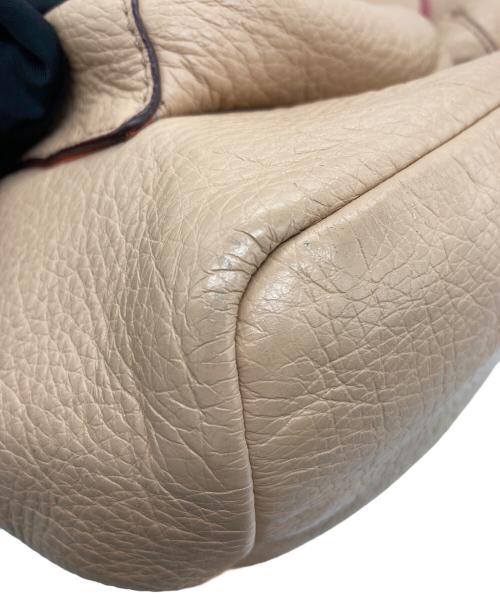 COACH（コーチ）COACH (コーチ) バッグパック オレンジ×ピンクの古着・服飾アイテム