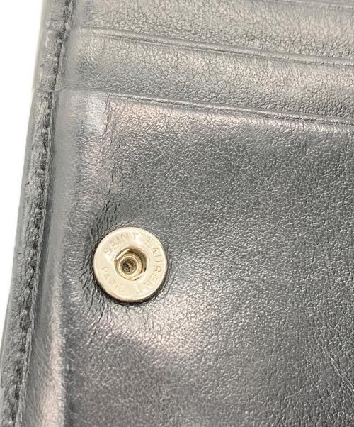 Yves Saint Laurent（イヴサンローラン）Yves Saint Laurent (イヴサンローラン) 2つ折り財布 ブラックの古着・服飾アイテム