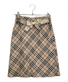 BURBERRY LONDON（バーバリーロンドン）の古着「タイトスカート」｜ベージュ×ブラック×レッド
