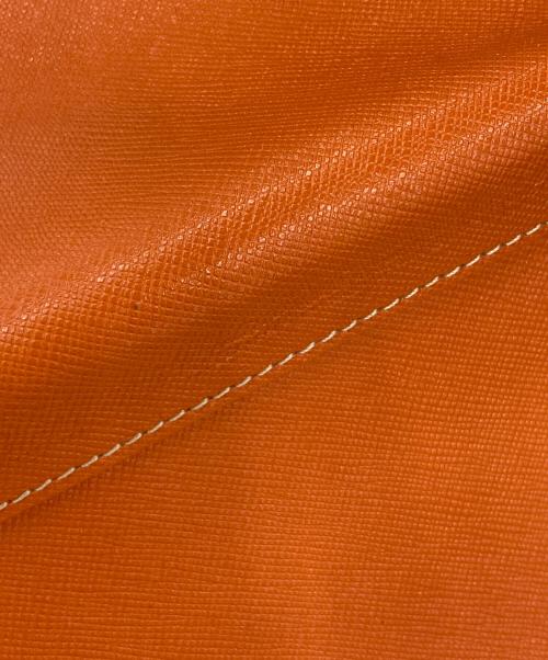 CASTELBAJAC（カステルバジャック）CASTELBAJAC (カステルバジャック) ラウンドファスナー長財布 オレンジ×ダークブラウンの古着・服飾アイテム