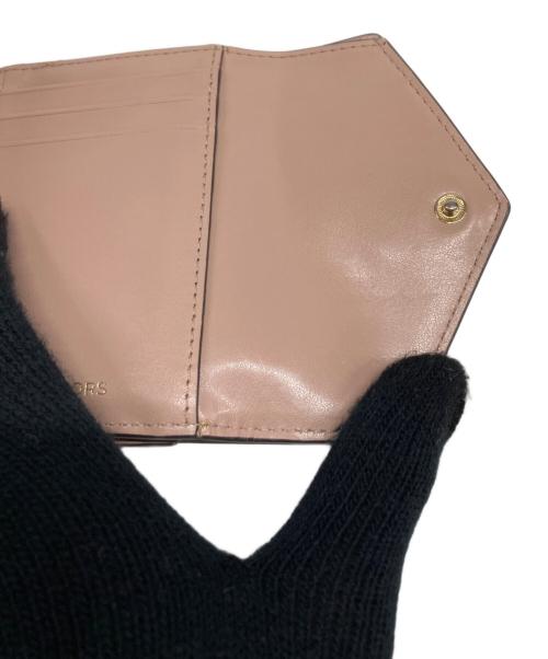MICHAEL KORS（マイケル・コース）MICHAEL KORS (マイケル・コース) 3つ折り財布 ソフトピンクの古着・服飾アイテム