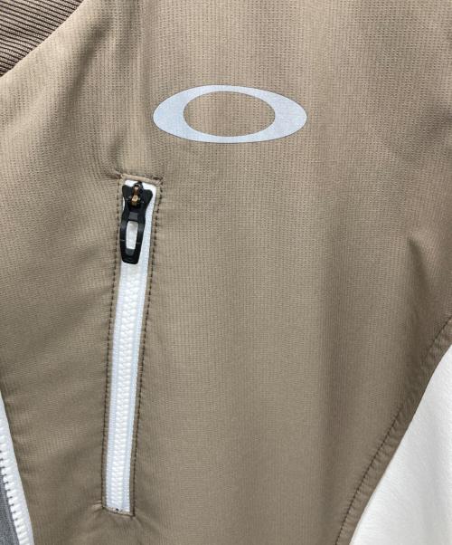 OAKLEY（オークリー）OAKLEY (オークリー) ゴルフウェア(トップス) ホワイト×ブラウン サイズ:2XLの古着・服飾アイテム