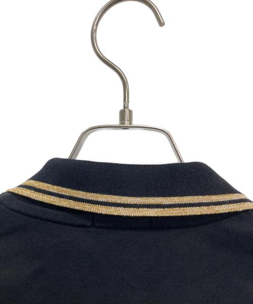 MONCLER（モンクレール）MONCLER (モンクレール) ポロシャツ ゴールド×ブラック サイズ:Sの古着・服飾アイテム