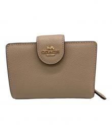 COACH（コーチ）の古着「2つ折り財布」｜ベージュ
