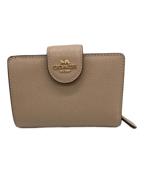 COACH（コーチ）COACH (コーチ) 2つ折り財布 ベージュの古着・服飾アイテム