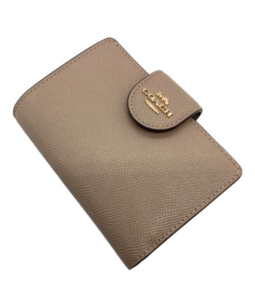 COACH（コーチ）COACH (コーチ) 2つ折り財布 ベージュの古着・服飾アイテム