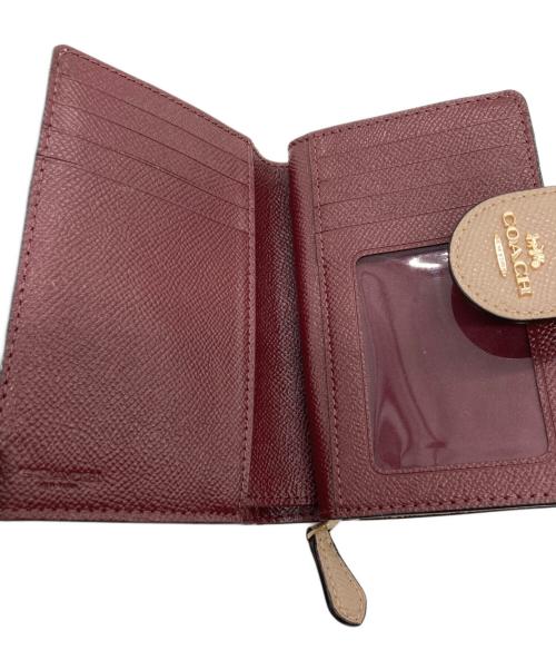 COACH（コーチ）COACH (コーチ) 2つ折り財布 ベージュの古着・服飾アイテム